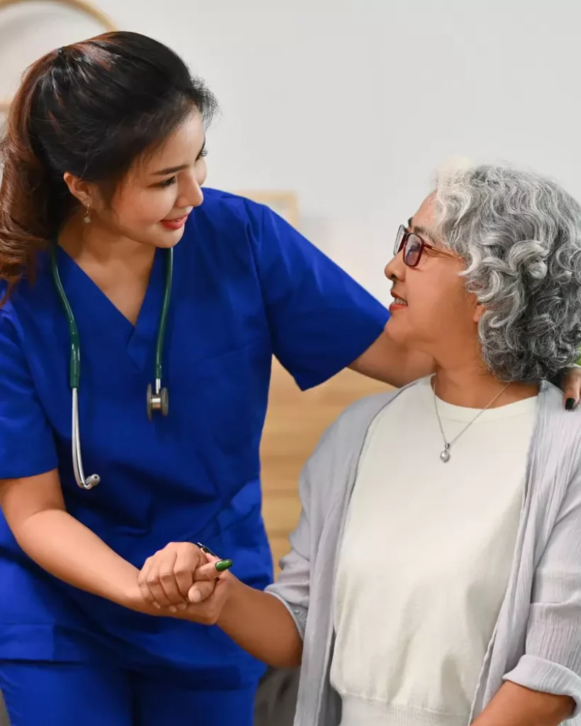 caring-woman-helping-senior-woman-at-home-2026-03-17-17-43-51-utc.webp